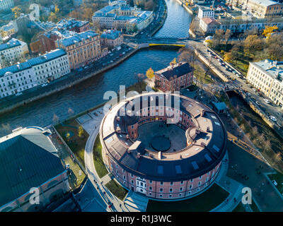 Aerial; drone view of historical city part with old architecture and modern park between two artificial river channel, round building in the center, S Stock Photo