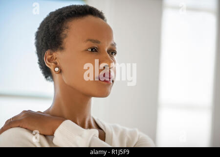 Portrait of a thoughtful young woman. Stock Photo