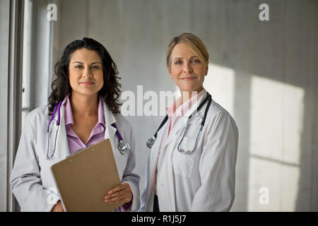 Two doctors standing together. Stock Photo