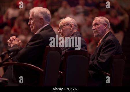 Three former prisoners of war (from left), Army Col. Ben Skardon, 101 (WWII), Army 1st Lt. Bill Funchess, 90 (Korea), and Air Force Col. Bill Austin, 80 (Vietnam) listen to a speech during a POW/MIA recognition ceremony at Clemson University, Oct. 4, 2018. All three men are Clemson alums - in 1938, 1948 and 1959, respectively - and all three returned to Clemson to work as faculty or staff after the wars. Amazingly, all three also still live within 15 minutes of the Clemson campus. ( Stock Photo
