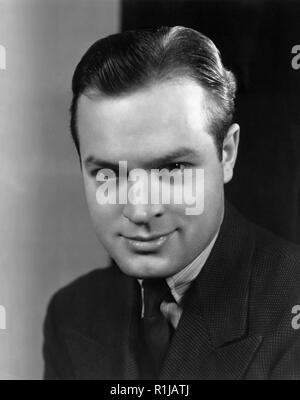 1940, Hollywood, Los Angeles, California, USA --- 1940- Hollywood, CA-  Bob Hope, famed NBC screen and radio comedian, is the father of two adopted children now and has to do his X-mas shopping early.  Here he is having a good shopping time in a Hollywood department store.  Bob's children are Donna, aged year and a half, and Tony, aged eight months.  Both come from Evanston's famous cradle. --- Image by © Bettmann/CORBIS© Corbis.  All Rights Reserved.Alien LandscapesWolf Tracer ArchiveWolf Tracer Archive Credit: Hollywood Photo Archive / MediaPunch Stock Photo