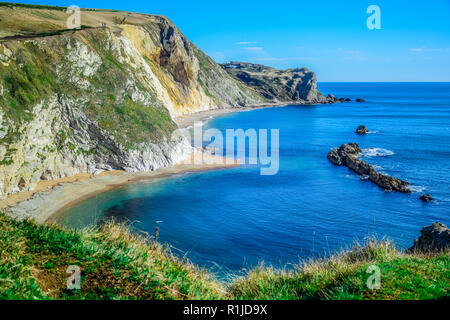 Beautiful landscape and seascape view of Durdle Door, a natural limestone arch on the Jurassic Coast near Lulworth in Dorset, England, United Kingdom
