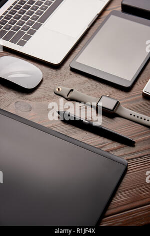 close-up shot of different modern gadgets on retoucher workplace Stock Photo