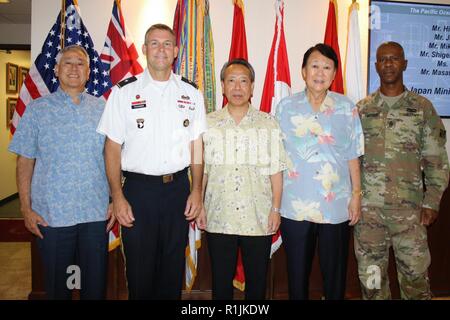 FORT SHAFTER, Hawaii (Oct. 23, 2018) Pacific Ocean Division (POD) Commanding General, Brig. Gen. Thomas Tickner (second to left), stands alongside Director General for Facilities and Installations, Minister’s Secretariat, Hirotomo Hirai (center), Japan Ministry of Defense, ahead of an office call and roundtable discussion regarding continued engineering partnership opportunities, proposed program improvements and solutions to shared challenges. Leaders from Naval Facilities Engineering Command Pacific also attended. POD, along with Japan District, conducts technical exchanges with the Japan Mi Stock Photo