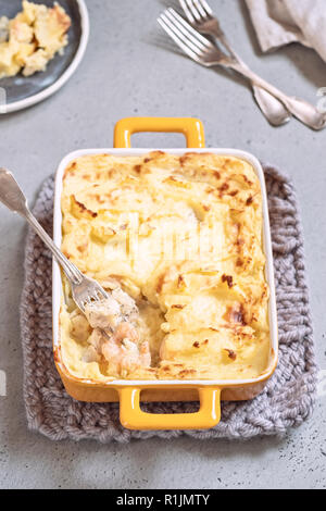 Fish pie with shrimp topped with mashed potato