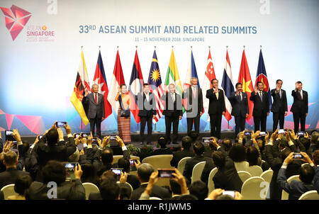 Singapore. 13th Nov, 2018. Leaders pose for photos during the opening ceremony of the 33rd summit of the Association of Southeast Asian Nations (ASEAN) in Singapore, on Nov. 13, 2018. The 33rd ASEAN summit opened here Tuesday with a call for upholding multilateralism and international cooperation. Credit: Li Gang/Xinhua/Alamy Live News Stock Photo