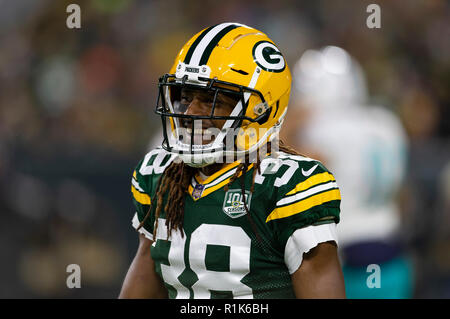 Green Bay, WI, USA. 11th Nov, 2018. Green Bay Packers defensive end Mike  Daniels #76 reacts toward Miami Dolphins offensive guard Jesse Davis #77  during the NFL Football game between the Miami