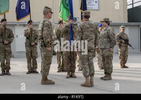 U.S. Army Maj. Gen. Robin Fontes, outgoing commander, Combined Security Transition Command - Afghanistan prepares to pass the CSTC-A guidon to U.S. Army Lt. Gen. James Rainey. Rainey assumed command of CSTC-A during the ceremony. (Resolute Support Stock Photo