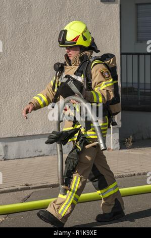 ANSBACH, Germany (Oct. 10, 2018) -- U.S. Army Garrison Ansbach firefighters conducted a fire drill exercise at the Barton Barracks, LRC in Ansbach,  during the fire prevention week 2018. The exercise was based on a simulated  scenario, rescuing a person from the 2nd floor and evacuating the remaining  personnel. Stock Photo
