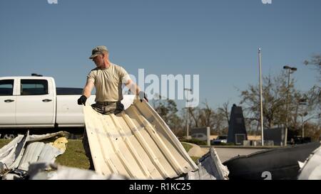 A recovery team from Joint Base Pearl Harbor-Hickam conducts excavation ...