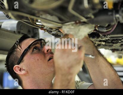 An Airman from the 18th Component Maintenance Squadron performs ...