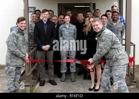 Members of the 346th Test Squadron, Unified Capabilities Assessment Program team cut the ribbon during a ceremony at Joint Base San Antonio-Lackland Medina Annex, Texas, Oct. 15, 2018. The ceremony was hosted to welcome the UCAP team to its new home. The team provides Department of Defense Information Network Approved Products List testing of communications equipment before the equipment can be connected to the DODIN. UCAP is the only Air Force lab that provides DODIN APL testing and results are accepted DOD-wide. Stock Photo