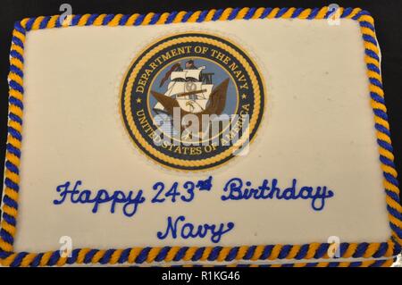 DAHLGREN, Va. (Oct. 12, 2018) - Naval Surface Warfare Center Dahlgren Division (NSWCDD) celebrated the Navy's 243rd birthday with a cake, speeches, conversations, and a curious artifact that seemed to preside over the celebration.  An aircraft course-setting bombsight - one of the few surviving bombsights tested at Dahlgren was on display as a historic reminder of Dahlgren's impact on the Navy over the past century. NSWCDD will celebrate 100 years of cutting-edge technological innovation in support of the warfighter at the centennial grand finale event Oct. 19 that includes an exhibition tent, Stock Photo