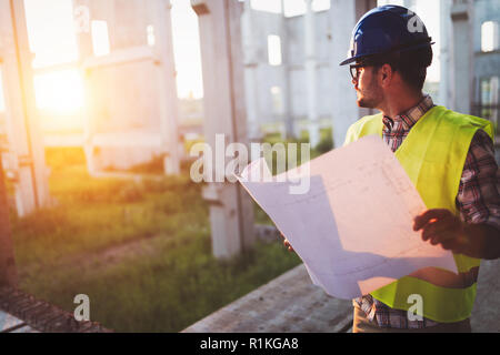 Young handsome business man construction site engineer Stock Photo