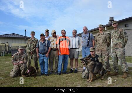 FORT BENNING, Ga. (Oct. 18, 2018) – Six Vietnam War veterans, who were former members of the 60th Infantry Platoon (Scout Dog) and who were accompanied by their Family members, visited Fort Benning Oct. 17 after almost 50 years to see how military working dogs were employed today. Stock Photo