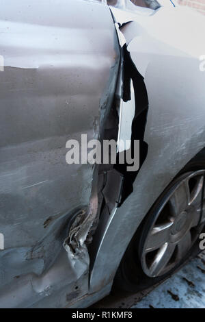 written off crash damaged citroen c4 car on a recovery trailer Stock Photo
