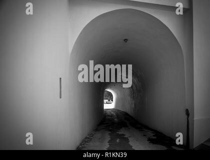 The arch turning into the tunnel of white color Stock Photo