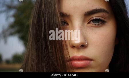 portrait of a beautiful 14 year old teenage girl with blue eyes Stock Photo