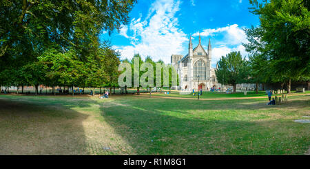 Summer time view of Winchester Cathedral west front - a stitched panorama in 2-1 format, Hampshire, UK Stock Photo