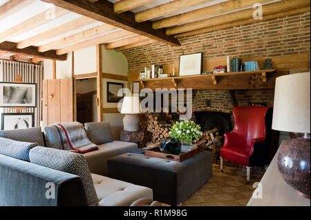 Rustic living room with exposed brick wall Stock Photo