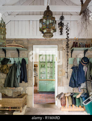 Storage around front door of country style house Stock Photo