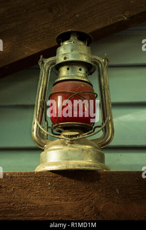 old red Soviet kerosene lamp, which was hung on the last carriage of a freight train. rarity. Russia Stock Photo