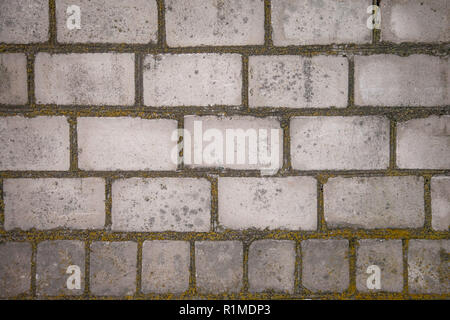 An old moldy brick wall. White brick. The fire in the furnace. Background. Close-up. Stock Photo