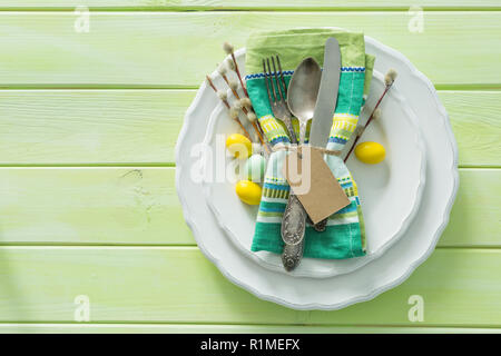 Easter table setting on wood background Stock Photo