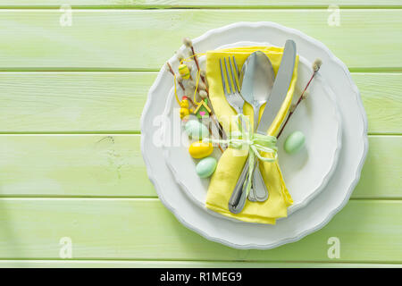 Easter table setting on wood background Stock Photo