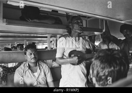 67/15 Baul singer  on train Sylhet 1980 Stock Photo