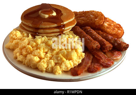 super breakfast with scrambled eggs, bacon, sausage, hashed browns and pancakes Stock Photo