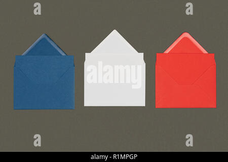 close-up view of blue, white and red envelopes isolated on black Stock Photo