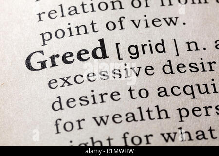 Fake Dictionary, Dictionary definition of the word greed . including key descriptive words. Stock Photo