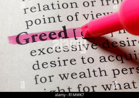 Fake Dictionary, Dictionary definition of the word greed . including key descriptive words. Stock Photo