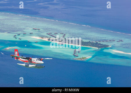 Aerial view of a seaplane approaching island in the Maldives Stock Photo