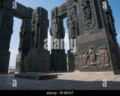 The Chronicle of Georgia is a monument that shows the life of Jesus Christ at the bottom of the pillars and Georgian Kings and Queens at the top. It's Stock Photo