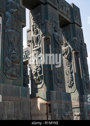 The Chronicle of Georgia is a monument that shows the life of Jesus Christ at the bottom of the pillars and Georgian Kings and Queens at the top. It's Stock Photo