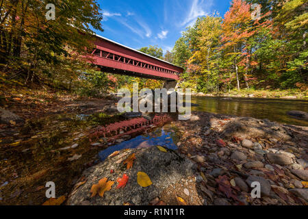 Swift River covered bridge in autumn from the river, Conway, New Hampshire Stock Photo