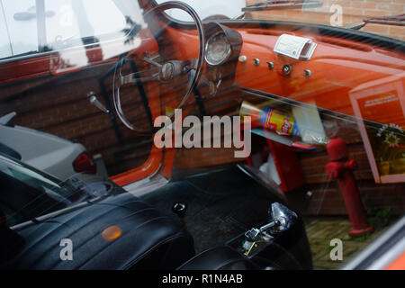 Interior view with leather accessories. Fiat 500 last century vintage car. 1950 1960 1970 1980 1990 Tuscany  Italy Europe Stock Photo