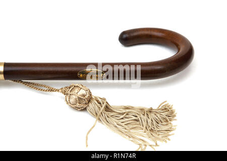 Wooden Handle and Tassel of Burberry's Umbrella Stock Photo