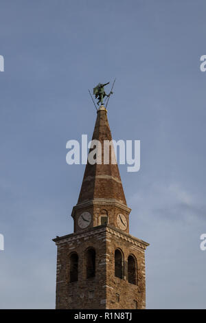 Bell tower of the Basilica of Saint Euphemia (Basilica di Santa Eufemia), Grado, Italy Stock Photo