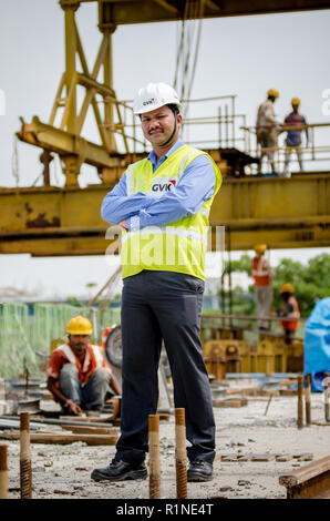 Portrait of a safety officer on the field at a construction site. Stock Photo