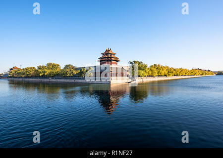 Watchtower of Forbidden City in autumn Stock Photo