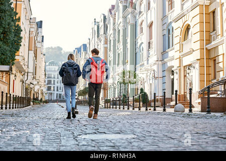 Young couple of travel bloggers are enjoying view of old city Stock Photo