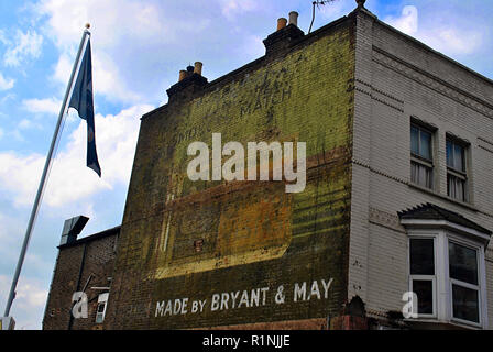 A Ghostsign for Bryant & May the smokers match, a 1950s painted advert that survived till 2015 when it was covered by building works. Stock Photo
