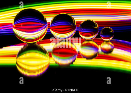 Light painting with four Lensball / crystal / glass ball Stock Photo