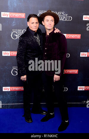 Johnny Depp (left) and Jude Law attending the Fantastic Beasts: The Crimes of Grindelwald UK premiere held at Leicester Square, London. Stock Photo