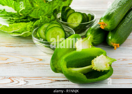 sliced green sweet pepper with cucumbers and cabbage Stock Photo