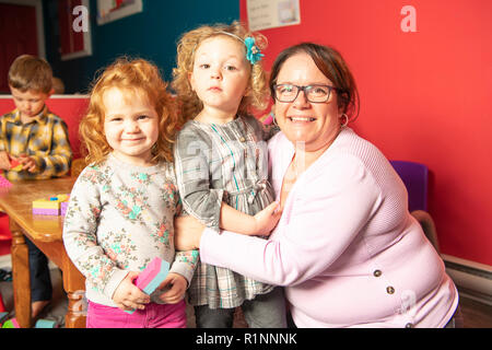 The cute preschoolers group in kindergarten together Stock Photo