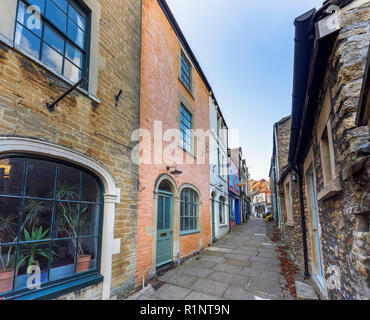 Paul Street, an alleyway off Catherine Hill with unspoilt quaint buildings and shops in the small eastern Somerset town of Frome, south-west England Stock Photo